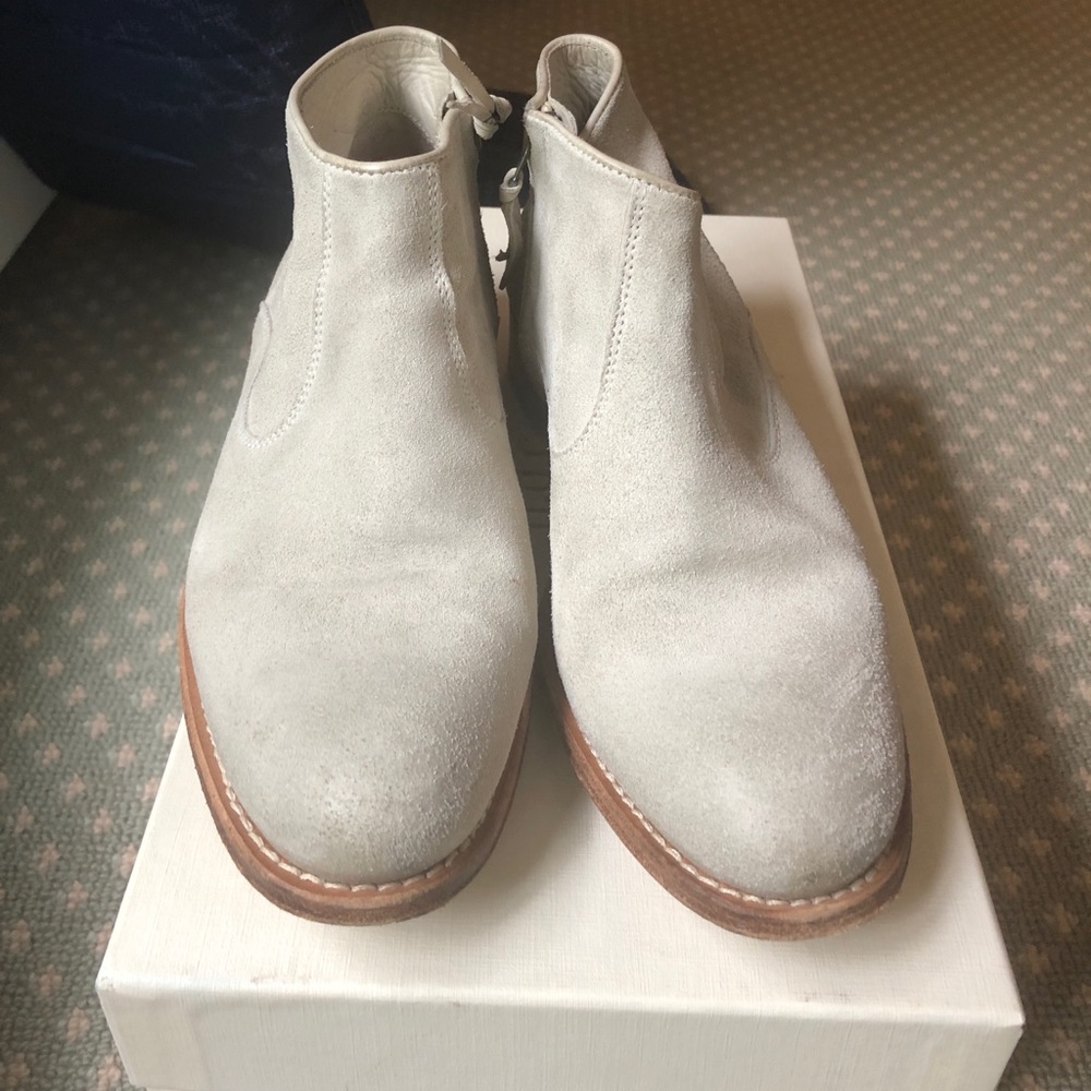 Soft and light gray Sunday n.d.c. zip up booties.